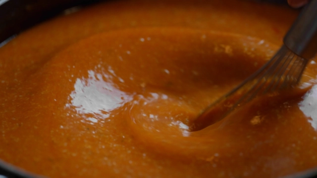 Lemon garlic butter sauce being stirred