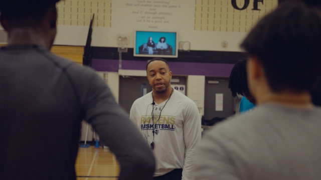 Coach Corey Hall doing an interview